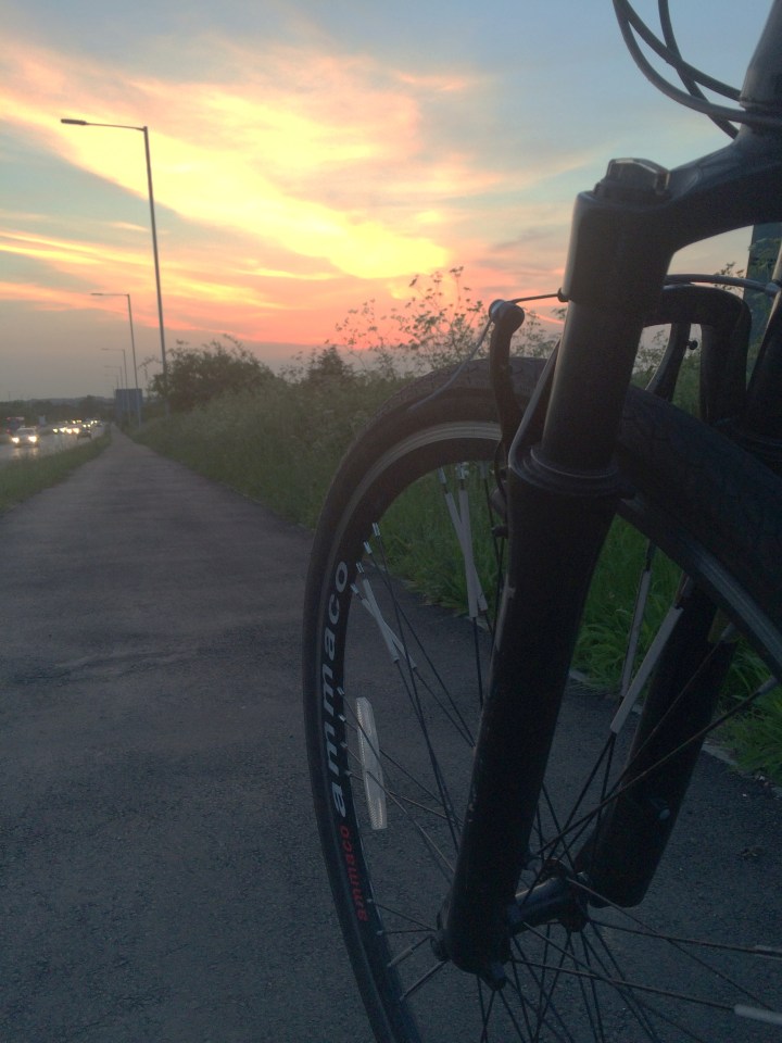 Hard to feel negative when cycling towards a sunset